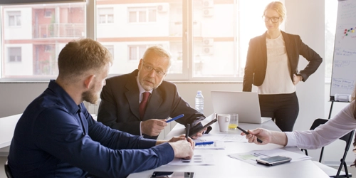 two-businessman-discussing-project-meeting